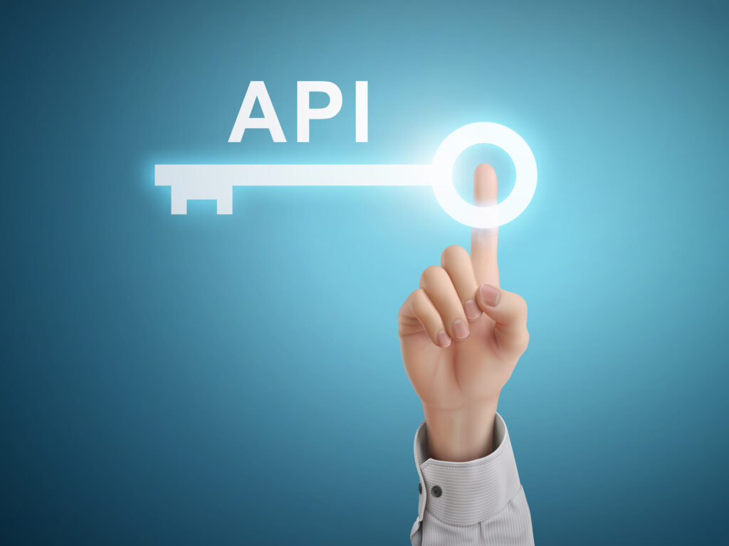 male hand pressing API key button over blue abstract background